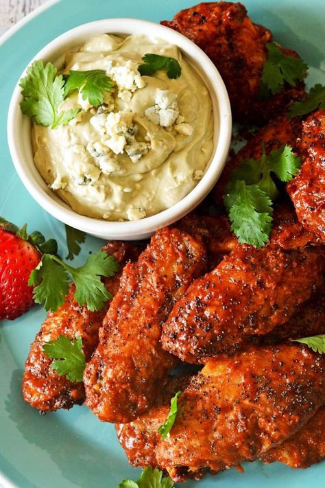 Oven-Baked Strawberry-Chipotle Wings With Avocado-Blue Cheese Dip Recipe | Can baked wings in a strawberry-based sauce be as delicious as fried buffalo wings? Yes. Yes they can. #chickenwings #footballrecipes #tailgating #footballparty #seriouseats #recipes Best Baked Wings, Strawberry Wings, Fried Buffalo Wings, Chipotle Wings, Blue Cheese Dip Recipe, Chicken Wing Sauce Recipes, Blue Cheese Chicken, Chicken Wing Dip, Mother Clucker