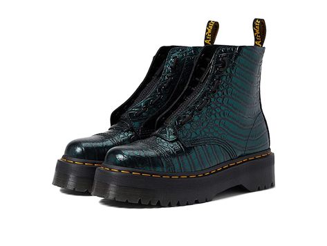 Dr. Martens Sinclair - Women's Boots : Green Wild Croc Emboss : Featuring an allover printed design, the Dr. Martens Sinclair Boots come with an ankle-length construction. Leather upper. Leather and textile lining. Leather and textile insole. Features classic Doc's DNA, including grooved heels, scripted heel loop, and visible yellow stitching. Goodyear welt construction where the upper and sole are heat-sealed and sewn together with the classic Z-welt stitching for long-lasting durability and fl Winter Outfits With Doc Martens, Green Doc Martens, Doc Martens Heels, Dr Martens Sinclair Boots, Calf Boots Outfit, Croc Outfits, Dublin Fashion, Dr Martens Sinclair, Doc Marten Boot