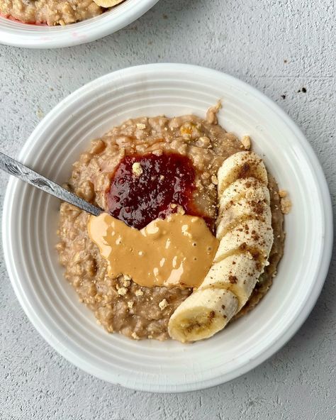 PB&J Oatmeal two ways. Fruit or jam? Third one is drizzled with date syrup. Can’t go wrong with this combo. #oatmeal #pbj #breakfast Date Syrup, Oatmeal Recipes, Syrup, Oatmeal, Jam, Fruit, Canning, Quick Saves