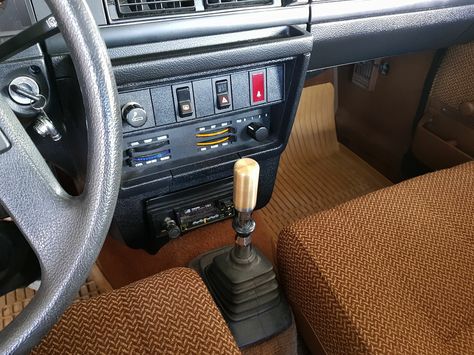 A custom Volvo 240 gear shift. Lovely interior on this classic Volvo 240. #volvo240 Volvo 240 Interior, Lovely Interior, Volvo 240, Gear Shift, Car Stuff, Steering Wheel Cover, Car Photography, Wheel Cover, Van Life