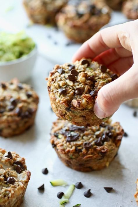 Zucchini Banana Baked Oatmeal Cups | A healthy and easy grab-and-go breakfast option for your busiest mornings! These Zucchini Banana Baked Oatmeal Cups are quick to make, meal prep friendly and great for kids & adults. || The Real Food Dietitians #glutenfreebreakfast #glutenfreerecipes #mealprepideas #easymealprep #healthymuffins #therealfoodrds Zucchini Banana Muffins, Yogurt Breakfast Bowl, Banana Zucchini Muffins, Greek Yogurt Breakfast, Oat Cookie Recipe, Pumpkin Pie Protein, Easy Breakfast Options, Zucchini Banana, Real Food Dietitians