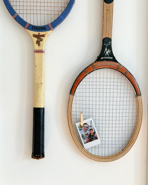 Old tennis rackets were on my 2024 thrift goals list, so ☑️ Also, added a cute lil picture of Zack and I playing tennis. We don’t actually know how to play, and we follow a very loose set of rules, but man — we have fun. ✨ vintage decor, thrifted tennis rackets, Polaroid, @fujifilm_instax_northamerica Tennis Racket Art Wall Decor, Old Rackets Decor, Old Tennis Racket Decor, Tennis Racket Wall Decor, Thrifted Decor Aesthetic, Vintage Tennis Racket Decor, Vintage Tennis Aesthetic, Tennis Racquet Decor, Thrifted Room Decor