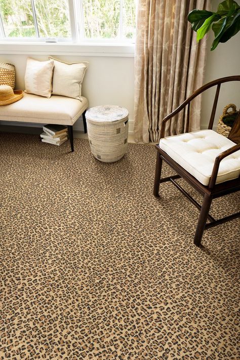 People often associate animal prints with an eclectic style, but that's not always the case. It's all about finding a balance. If you don't want to go to the extreme, we recommend pairing Onta carpet from The Dabbieri Collection® in an eclectic cheetah print with natural woven elements, like baskets, and neutral toned furniture, such as cream colored seating options and curtains. Add contrast with a dark wood chair and bench legs. Cheetah Print Carpet, Stanton Carpet, African Plains, Luxury Flooring, Earthy Color Palette, Mineral Spirits, Printed Carpet, Flooring Options, Carpet Design