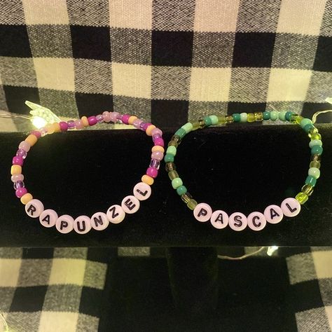 Rapunzel & pascal beaded bracelets Rapunzel Bracelet, Rapunzel Pascal, Different Shades Of Purple, Rapunzel And Flynn, Handmade Beaded Bracelets, Plastic Letters, Bracelets Ideas, Bracelet Inspo, Different Shades Of Green