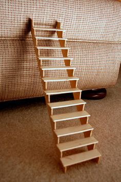 stairs - The sides are balsa wood and the steps are popsicle sticks. Yep, popsicle sticks. Kandang Hamster, Popsicle Stick Houses, Sticks Furniture, Diy Popsicle, Popsicle Crafts, Diy Dolls, Desain Quilling, Doll House Plans, Fairy Furniture