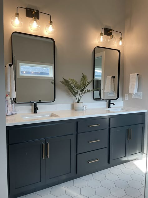 Black Floor White Vanity Bathroom, Bathroom Color Schemes Black Hardware, Bathroom Decor Black Vanity, Black White Green Master Bath, Iron Ore With Black Hardware, Bathroom With Black And Brass Fixtures, Guest Bathroom Ideas Black Vanity, Black White And Brass Bathroom, Black And Gold Accent Bathroom