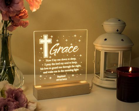 The transparent acrylic material is like a glass art, with a wooden base that feels comfortable to the touch, and the base of the acrylic photo frame has a built-in warm light strip, which is a perfect decoration whether it is placed on the bedside or on the table, making this transparent acrylic plaque add a touch of fun and uniqueness to your home environment. Baby Girl Baptism Gift, Baby Christening Gifts, Nursery Night Light, Custom Baby Gifts, Girl Baptism, Return Gifts, Gift Shops, Mugs Ceramic