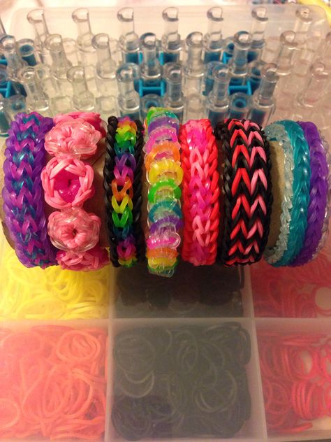 Rainbow loom bracelets Loom Band Bracelets Aesthetic, Crazy Loom Bracelets Patterns, Scene Loom Bracelets, Rainbow Loom Bracelets Aesthetic, Rainbow Loom Inspiration, Rainbow Loom Charms Tutorial, Rubber Band Bracelet Ideas Loom Patterns, Crazy Loom Bracelets, Loom Bands Designs