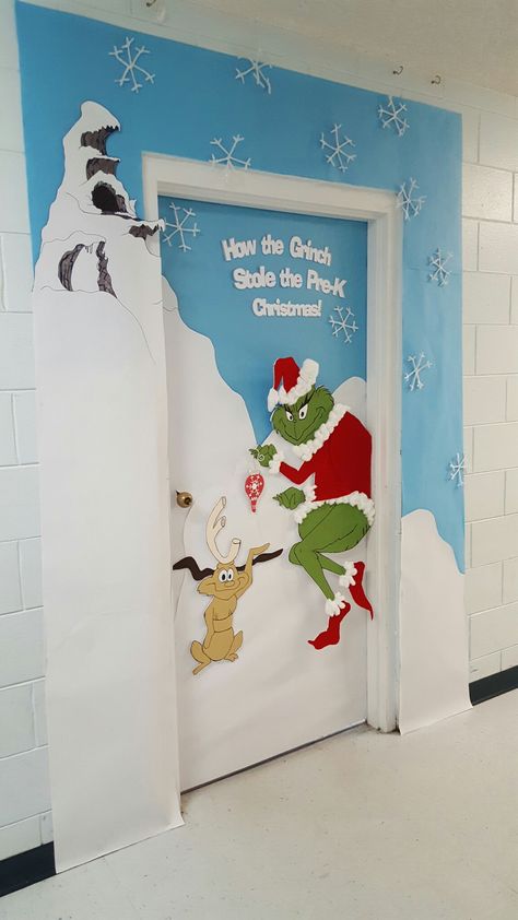 Grinch Classroom Door: Grinch and Max painted on foam board with felt and cotton ball Santa suit. Could hold a number of stolen Christmas items. Mine held a story book with a rhyme about why he stole Christmas from our classroom. Grinch Who Stole Christmas Decorations, The Grinch Door Ideas, How The Grinch Stole Christmas Door Decoration, Easy Grinch Door Decorations, Grinch Door Contest, Christmas Door Ideas For Classroom Grinch, Christmas Classroom Door Grinch, The Grinch Christmas Decorations Diy Classroom, Grinch Themed Door