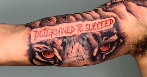 Determined To Succeed Tattoo, Tiger Eyes Tattoo Bicep, Inside Bicep Tattoo Men Half Sleeves, Bicep Tattoo Men Sleeve, Single Tattoos Men, Tattoo Ideas For Men Bicep, Bicep Tattoo Men Ideas, Inner Bicep Tattoo Men Ideas Design, Cartoon Tattoos Sleeve