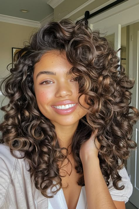 hair hairstyles,hair styles for long hair,hair cut,hair beauty,hair styles for medium hair,hair and skin and nails,hair hairstyling,hair length,hair straightener,hair drawing,hair cuts,hair colors #HairstyleTrends #HairTransformation #CurlyHairRoutine #BraidedHairstyles #HairColorInspiration #HairCareTips #ShortHairStyles #BalayageHair #WeddingHairstyles #HairAccessories #NaturalHair #HealthyHair #LongHairDontCare #MensHair #HairGoals #EasyHairstyles #HairGrowth #UpdoHairstyles #BlondeHair #HairProducts Colored Permed Hair, Haircuts For Curly Hair And Round Face, Curly Haircuts Middle Part, Curly Rounded Layers, Volume Curly Haircut, 2c Curly Haircut, Winter Curly Hair Color, Curly Hair Partial Highlights, Curly Fall Hair Color