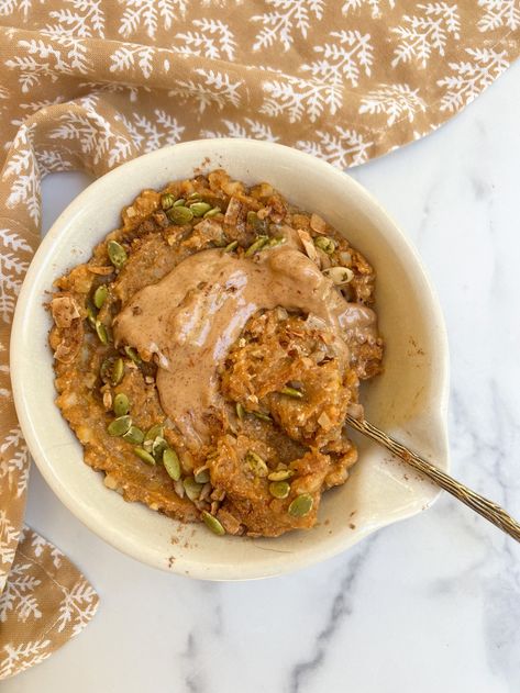 Simple and high-protein warm pumpkin protein bowl recipe Pumpkin Breakfast Bowl, The Peachy Spoon, Pumpkin Protein Breakfast, The Peachie Spoon Recipes, Peachie Spoon Recipes, The Peachie Spoon, High Protein Pumpkin Recipes, Pumpkin Protein Oatmeal, Peachie Spoon