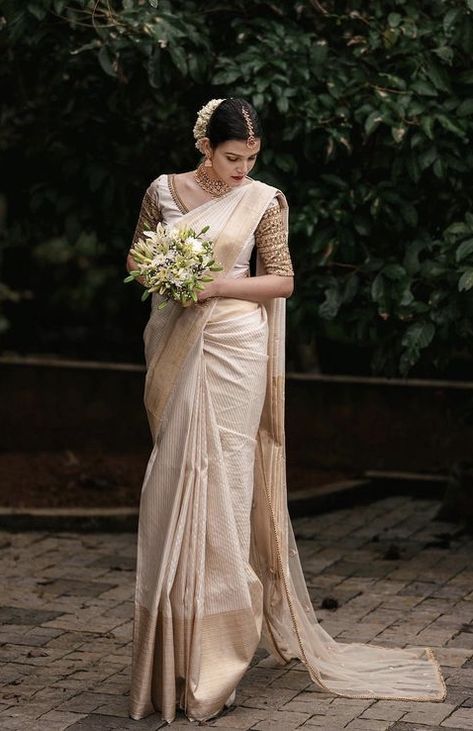 Beige Wedding Saree, Indian Christian Wedding Saree, Christian Saree Wedding, Madhuramveppu Ideas, Buddhist Bride In White Saree, Kerala Christian Wedding Saree, Christian Bride Saree, Manthrakodi Saree Christian, Buddhist Bride