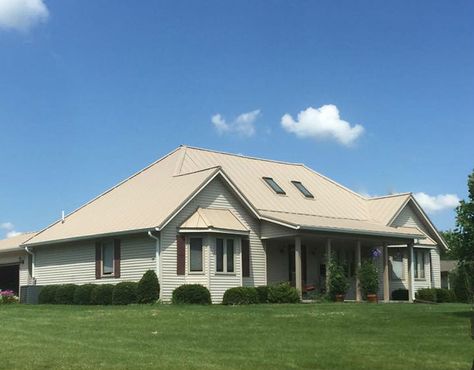 CMG’s steel coil in Sierra Tan TEXTURED was used to complete this project. Sierra Tan TEXTURED has an Ultra-Cool Rating of 45.8% for reflectivity and .83 for emissivity. It has an SRI rating of 50. In 26ga, Sierra Tan TEXTURED comes with a 35 year... Read More Tan Metal Roof, Wall Panel System, Textured Coat, Standing Seam, Panel Systems, Roof Panels, Metal Roof, Wall Paneling, Home Projects