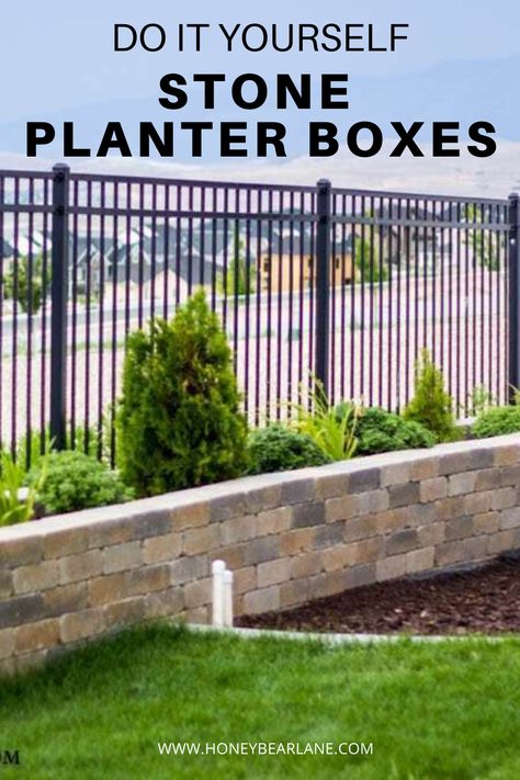 If you're looking to take your yard up a notch, why not try making these DIY stone planter boxes? They last forever and add beauty and organization to your plants.  How to build stone planter boxes.  Backyard landscaping along fence. Diy Stone Planter, Stone Planter Boxes, Front Yard Planters, Building Planter Boxes, Yard Planters, Backyard Planters, Landscaping Along Fence, Brick Planter, Stone Planter