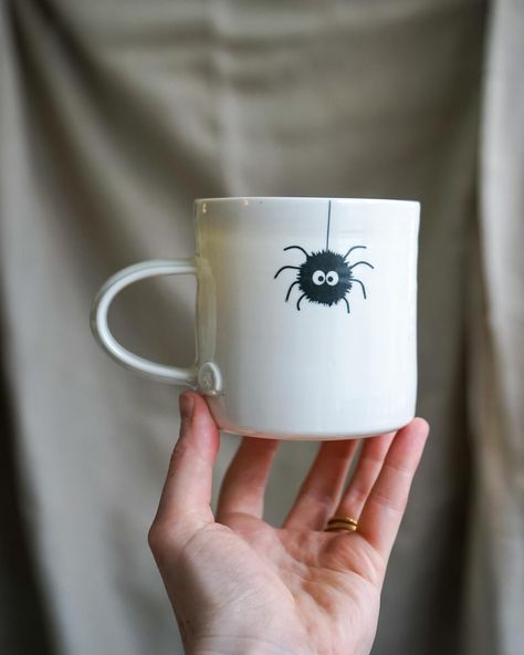 Halloween ready 👻🎃 It feels too early to be preparing for it, but here we have it! At the end of this month I’ll be launching my new ghost mugs along with the few I saved from last year 👏 I’m working on getting some ghost tea light holders made but that will be closer to Halloween when they’re ready 👻 I also have a few gold lustre potion mugs that aren’t photographed yet! 🤩 Mug Pottery Painting, Ghost Mugs, Sophisticated Halloween, Painting Halloween, Mug Pottery, Black Spider, Red Leaves, Halloween Mug, White Mug