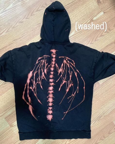 bleached it 😎 didnt turn out how i wanted it to, but im happy with it 🙏 now i have a matching sweater to my skeleton shirt #ninespages #art #artist #diy #diyclothes Bleach Hoodie Designs Skeleton, Bleach Skeleton Hoodie Tutorial, Bleached Hoodie Designs Alt, Bleach Art Hoodie Wings, Butterfly Bleached Hoodie, Bleach Hoodie, Bleach Shirt Diy, Alt Style, Matching Sweaters