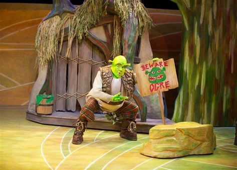 Princess Fiona rescues First Stage Children's Theater's 'Shrek' Shriek The Musical, Shrek Musical Set, Shrek The Musical Set Design, Shrek Signs, Shrek Jr Set Design, Shrek Set Design, Shrek Musical, Shrek Costumes, Theater Lobby