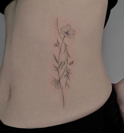 flower tattoo Flower Stem Word Tattoo, Whispy Flower Tattoo, Stemmed Flower Tattoo, Wispy Flower Tattoo, Primrose Tattoo Design, Soft Flower Tattoo, Gladiolus Tattoo Simple, Primrose Tattoo, Tattoo Rib