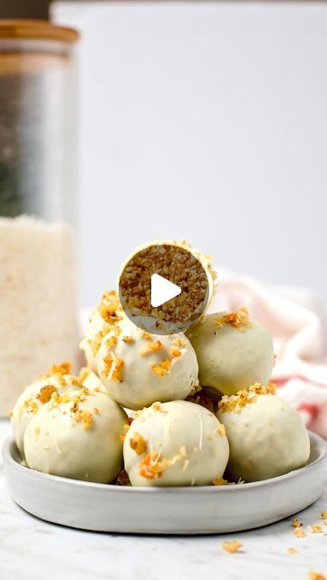 LUBA PAVIA on Instagram: "MY VIRAL RICE CRISP CARROT CAKE BITES

I’ve been making these on repeat the last few weeks! They’re perfectly moist inside, just like a carrot cake and the hint of spice adds a wonderful depth of flavour.

Save the recipe below and let me know in the comments below if you’re gonna make it🙌

Ingredients:
8 rice cakes
1/2 cup walnuts
1 medium carrot
1 cup Medjool dates (see notes below)
1 teaspoon cinnamon
1/2 teaspoon ground cardamom
1/2 teaspoon ground ginger
50g white chocolate, melted (I used dairy-free)
additional coconut and walnuts, for rolling
Method:
Peel and chop carrot. Add rice cakes, walnuts, carrot pieces, dates and spices 
into a food processor. Pulse until the mixture comes together and resembles a sticky paste. If the mixture is too crumbly add mor Carrot Cake Bites, Cook Vegetarian, Rice Cake Recipes, Rice Crisps, Plant Based Cookbook, Cake Bites, Medjool Dates, Healthy Sweets Recipes, Ground Ginger