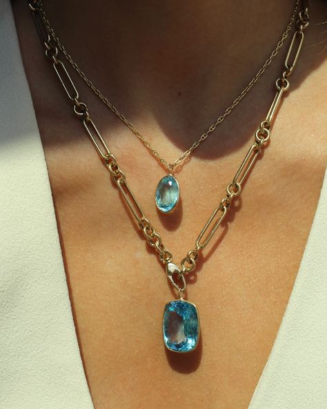 Luxury Layering Gemstone Necklaces, Luxury Gold Necklace With Blue Topaz, Blue Gemstone Pendant Charm Necklaces, Blue Topaz Crystal Necklaces, Gold Necklace With Faceted Blue Topaz, Necklace Stack, Necklace Layering, Trombone, Smoky Quartz