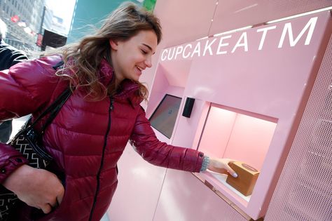 In cities like New York City, Los Angeles, and Dallas, you can walk up to a 24-hour sidewalk cupcake-dispensing machine and purchase a delicious cupcake, like this chocolate marshmallow one below, with your credit card. Unusual Wedding Photos, Live Crabs, British Shop, Vending Machine Business, Running Day, Premium Cigars, Money Machine, Chocolate Marshmallows, Vending Machines