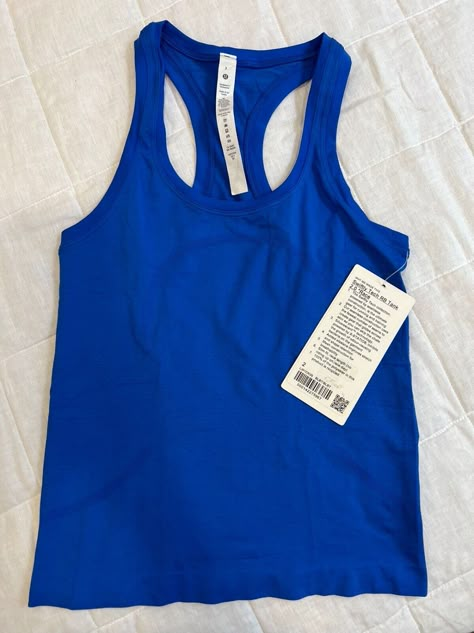 Basic Lululemon Outfits, Lululemon Sports Tank Top, Lululemon Fitted Racerback Top, Lulu Swiftly Tech Blue, Lululemon Poshmark, Lululemon Swiftly Tech Race Length, Lulu Tank Top, Blue Lululemon Sporty Top, Lululemon Tanks