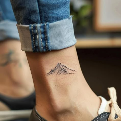 Mountain Symbol Tattoo, Mountain And Compass Tattoo, Ankle Mountain Tattoo, Ankle Tattoo Fine Line, Mountain Hand Tattoo, Nepal Tattoo Ideas, Mountain Tattoo Ankle, Fine Line Compass Tattoo, Mountain Line Tattoo