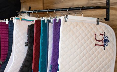 How To Store Saddle Pads Efficiently Tack Room Organization, Horse Tack Rooms, Saddle Stand, Pad Storage, Western Pleasure Horses, Barrel Racing Saddles, Saddle Rack, Horse Saddle Pads, Horse Halters