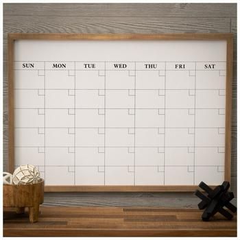 Dimensions: 21.75" H x 30.75" W x 1" D Material: MDF & Plastic Shape: Rectangle Color: White, Black & Brown Orientation: Horizontal Includes: 2 Sawtooth Hangers Quantity: 1 Keep track of important details, appointments, and notes with this Monthly Framed Dry Erase Calendar Board. Featuring forty-two squares for marking each day, this cool wood-framed board is simply perfect for home or work use. Hang it up in your living room or bedroom and start marking the days to keep yourself up to date!   * Glass Calendar Board, Monthly Wall Calendar, Office Calendar Wall Ideas, Calendar White Board, Office Wall Calendar, House Calendar, Office Command Center, White Board Calendar, Family Organization Wall