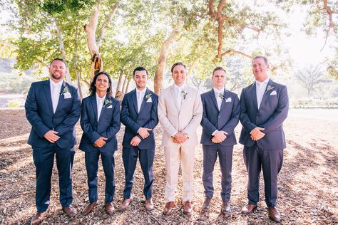 Tan Groom Navy Groomsmen, Groom In Tan Groomsmen In Navy, Beige Groom Navy Groomsmen, Groom Tan Suit Groomsmen Navy, Navy And Tan Groomsmen, Tan Suit For Groom, Navy Blue And Tan Groomsmen Suits, Tan And Blue Groomsmen Attire, Blue And Tan Groomsmen