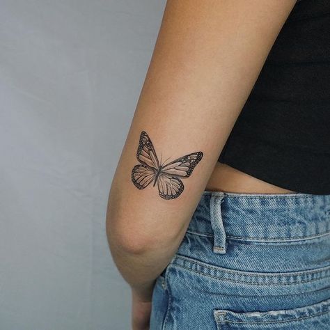 Lena (@princesslena.ink) 🦋 for Catherine. Thank you for trusting me with your very first tattoo☺️ #butterfly #butterflytattoo #realisticbutterflytattoo #finelinebutterflytattoo #gettattooed #smalltattoo #smallbutterflytattoo #abovetheelbowtattoo #elbowtattoo #armtattoo #backofarmtattoo #detailedtattoo #delicatetattoo #detailedbutterfly #monarchbutterfly #monarchbutterflytattoo #🦋 #🦋tattoo #firsttattoo #firsttattoo❤️ #nyctattoo #nyctattooartist #tinytattoos #tattooapprentice #bookingsopennow Monarch Tattoo, Above Elbow Tattoo, Realistic Butterfly Tattoo, Monarch Butterfly Tattoo, Butterfly Tattoos On Arm, Butterfly Back Tattoo, Back Of Arm Tattoo, Small Girly Tattoos, Flying Tattoo