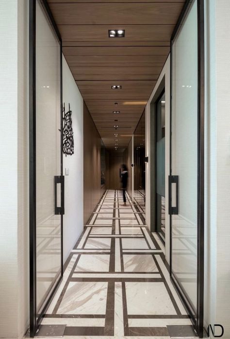 Apartment With Apt Use Of Materials And Color Scheme | AND Architects - The Architects Diary Marble Flooring Pattern Design Entrance, Corridor Flooring Pattern, Passage Flooring Pattern, Passage Flooring Design, Marble Flooring Pattern Design, Corridor Flooring Design, Lobby Flooring Design, Modern Marble Floor Pattern Design, Office Flooring Design