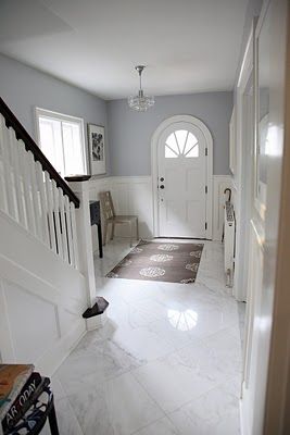 i've always hated marble entry floors, but this one may change my mind. Wood Paneling Living Room, Hallway Tiles Floor, White Wood Paneling, Top Bathroom Design, Foyer Flooring, Entryway Flooring, White Marble Floor, Stairs In Living Room, Hallway Flooring