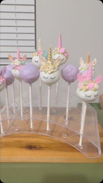 Kym's Crafts on Instagram: "✨🦄 Unicorn Magic in Every Bite! 🦄✨

These 1/2 vanilla, 1/2 sprinkle unicorn cakepops are pure magic—inside and out! 🌈 Each one is hand-dipped, each flower hand placed, and topped with just the right amount of edible glitter (okay, maybe a little more because why not? 🤪). My kitchen looks like a sparkle explosion, and I’m not mad about it! 💖

Perfect for parties, gifts, or just treating yourself to some whimsical sweetness. ✨ Who else is a unicorn lover? Let’s spread the magic! 💫

🎉 Drop a 🦄 in the comments if you’re ready to order or share with a fellow glitter fan!

#unicorncakepops #cakepops #unicorntreats #edibleglittergoals #sparklelove #smallbusiness #customdesserts #whimsicalbakes #ThisWasByFarMyMostChallengingSet #magicaltreats #bakerslife" Unicorn Cakepops, Unicorn Cake Pops, Unicorn Treats, Kitchen Looks, Custom Desserts, Unicorn Magic, Edible Glitter, Unicorn Lover, A Unicorn