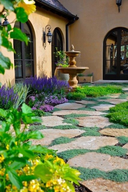 Flagstone path.. Flagstone Front Yard, Mediterranean Garden Courtyard, Country Landscaping Ideas, Tuscan Landscape Design, French Country Landscaping, Mediterranean Courtyard, Backyard Escape, Mediterranean Garden Design, Flagstone Path