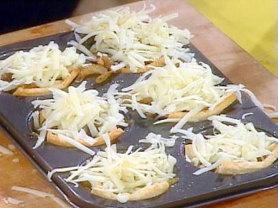 French Onion Tartlets Recipe | Rachael Ray | Food Network Onion Tartlets, Onion Appetizers, Onion Frittata, Tartlets Recipe, Rachael Ray Recipes, Onion Tart, Cooking With Olive Oil, Rachael Ray, Party Food Appetizers