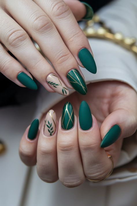 Embrace the beauty of autumn with these stunning olive green nails featuring delicate maple leaf designs. This chic style perfectly captures the essence of fall, blending rich green tones with warm, earthy accents. Whether you鈥檙e heading to a harvest festival or just want to celebrate the season, this look is both artistic and sophisticated. Get inspired by these fall nail ideas and elevate your nail game! Olive Nail Art Designs, Thanksgiving Nail Ideas Green, November Green Nails, Loki Nails Simple, Blue Fall Nails 2024, Thanksgiving Nails Green, Green Thanksgiving Nails, Green Gold Nails Ideas, Green Vine Nails