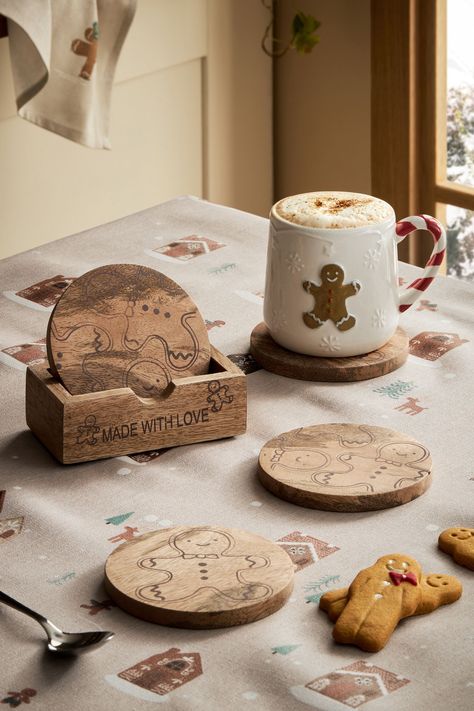 This set of 4 wooden coasters feature sweet gingerbread character engravings and can be easily stored away in the holder. Perfect for adding a touch of Christmas to your living space. Wipe clean only. 100% Wood. Christmas Wooden Coasters, Wooden Christmas Coasters, Coaster Engraving Ideas, Pyrography Coasters, Sweet Gingerbread, Drink Gifts, Diy Laser Cut, Laser Cut Wood Crafts, Laser Engraved Gifts