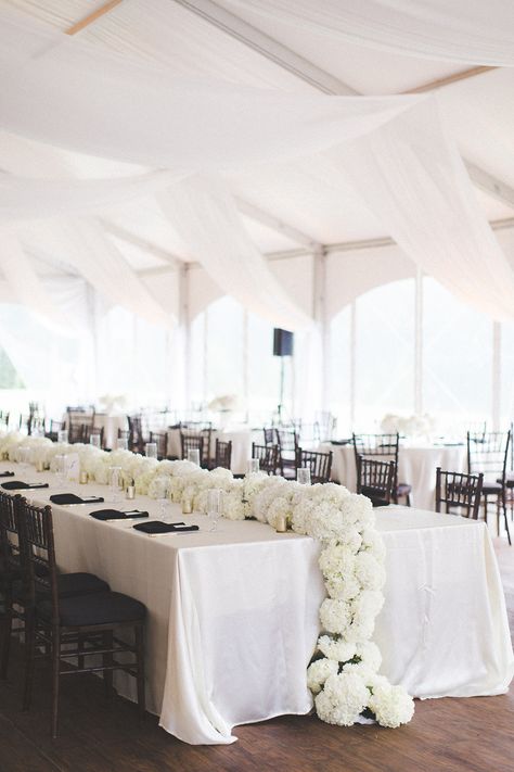 Hydrangea Garland Wedding, Hydrangea Long Table Centerpiece, Simple White Hydrangea Centerpiece, Black Linen White Flowers Wedding, White Hydrangea Tables, Hydrangea Arrangements Wedding, White Hydrangea Black Vase, Garland Centerpiece, Hydrangea Garland