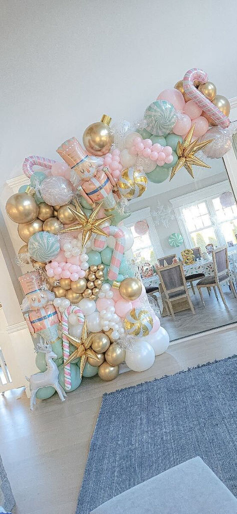 A Dreamy Pastel Nutcracker Christmas Balloon Garland Decoration designed by @BalloonacyBoston Diy Pastel Nutcracker, Barbie Nutcracker Birthday Party, Pastel Christmas Backdrop, Christmas Theme Pictures, Pink Christmas Balloon Arch, Pastel Christmas Balloons, Pink Balloon Christmas Tree, Pink Christmas Cake Pops, Nutcracker Balloon Garland