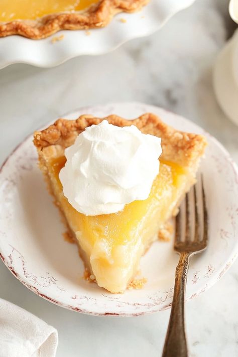 Old-fashioned vinegar pie is a tangy, sweet classic with a buttery crust and spiced filling—perfectly simple and comforting for any occasion. Vinegar Pie, Southern Pies, Chess Pie Recipe, Homemade Pie Recipes, Chess Pie, Pudding Pie, Pudding Pies, Pie Safe, Custard Filling