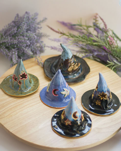 Ceramic witch hats, tealight holders Ceramic Witch Hat, Cool Incense Holder, Clay Witchy Crafts, Creative Ceramics Ideas, Witchy Ceramics, Witch Ceramics, Clay Decor Ideas, Fun Pottery Ideas, Witch Diy Crafts