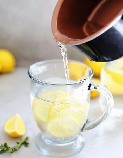 15 Benefits Of Drinking Lemon Water Benefits Of Hot Lemon Water, Health Benefits Of Lemon, Lemon Water In The Morning, Lemon Water Detox, Boil Lemons, Drink Lemon Water, Benefits Of Drinking Lemon Water, Lemon Water Before Bed, Lemon In Water