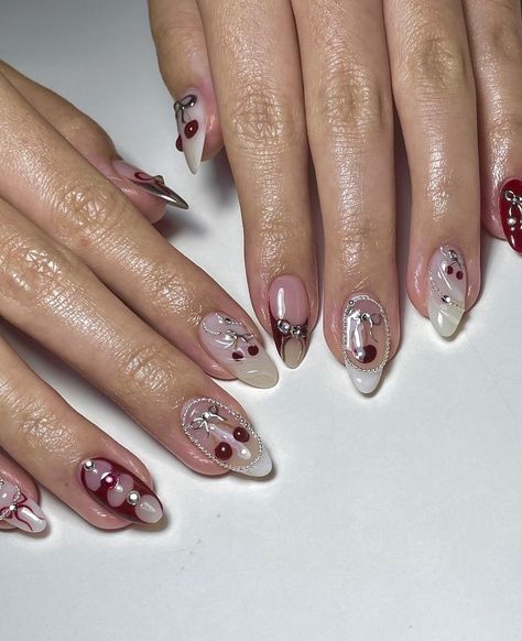 cherry coquette burgundy gel nails inspo Cherry Coquette Nails, Cherry Gel Nails, Dark Coquette Nails, Burgundy Gel Nails, Cherry Mocha Nails, Nessa Nails, Black Silver Nails, Cherry Nail, Concert Nails