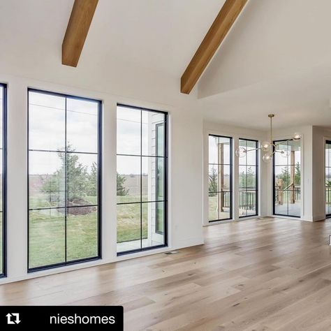 Windsor Windows on Instagram: “Can’t get enough of this incredible wall of Windsor Next Dimension painted black vinyl windows by @nieshomes. 😍😍😍 . . . #Repost @nieshomes…” Peak Windows Living Rooms, Open Floor Plan Large Windows, Windows That Go To The Floor, Large Home Windows, Big Windows Small House, Modern Windows Interior, Great Room With Wall Of Windows, Large Windows Back Of House, Big Picture Window Ideas