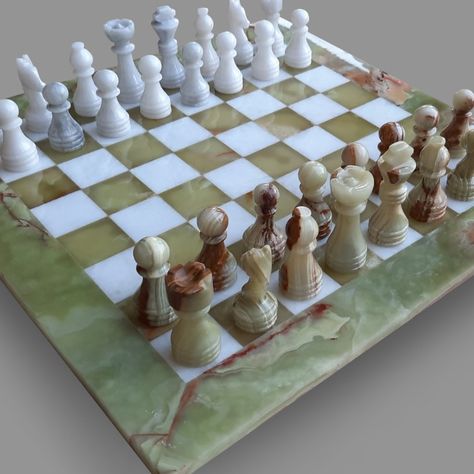 Introducing our Handmade Multi Green Onyx & White marble Chess Set, a stunning addition to any chess player's collection. Measuring 15 x 15 inches, this exquisite chess set is meticulously crafted by skilled artisans using high-quality multi green onyx stone. Each piece is hand-carved with intricate detailing and polished to a smooth finish, making this set not only a game board but also a work of art. Stone Chess Set, Chess Boards, Marble Chess Set, Green Onyx Stone, Chess Players, Marble Stone, Game Board, Marble Stones, Green Onyx