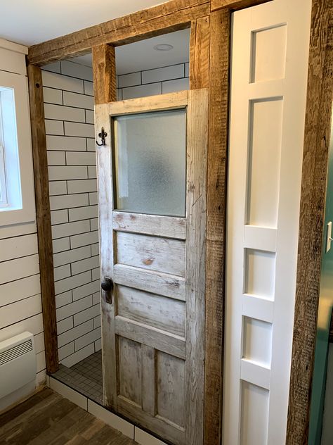 Rustic Shower Door Ideas, Diy Shower Stall Cheap, Walk In Shower Wall Ideas, Rustic Bathroom Door, Barn Door Shower Doors Walk In, Diy Shower Door Ideas, Galvanized Shower Walls, Small Cabin Bathroom, Wood Look Tile Bathroom