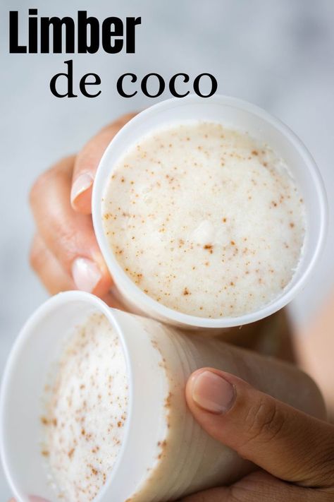 a hand holding 2 cups of limber de coco. Authentic Puerto Rican Recipes, American Dessert Recipes, Limber Recipe, American Dessert, Coconut Sorbet, Puerto Rico Food, Boricua Recipes, Coconut Ice, Flan Recipe