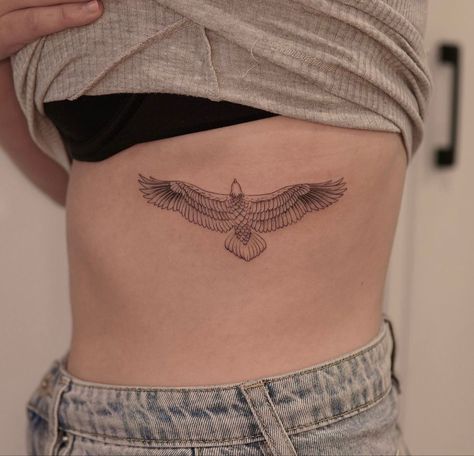 Eagle Collar Bone Tattoo, Simplistic Eagle Tattoo, Eagle Arm Tattoo For Women, Architects Tattoo, Bird Tattoo Ribcage, Hawk Tattoo Ribs, Fine Line Eagle Tattoo, Birds Rib Tattoo, Hawk Fine Line Tattoo